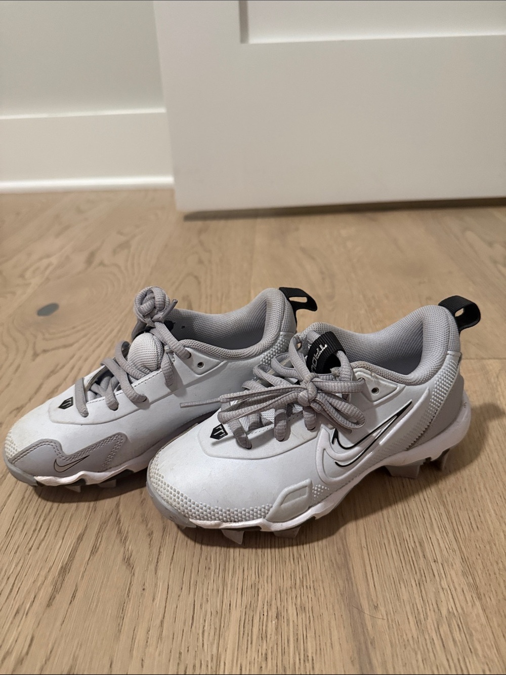Nike Kids White and Light Gray Athletic Cleats